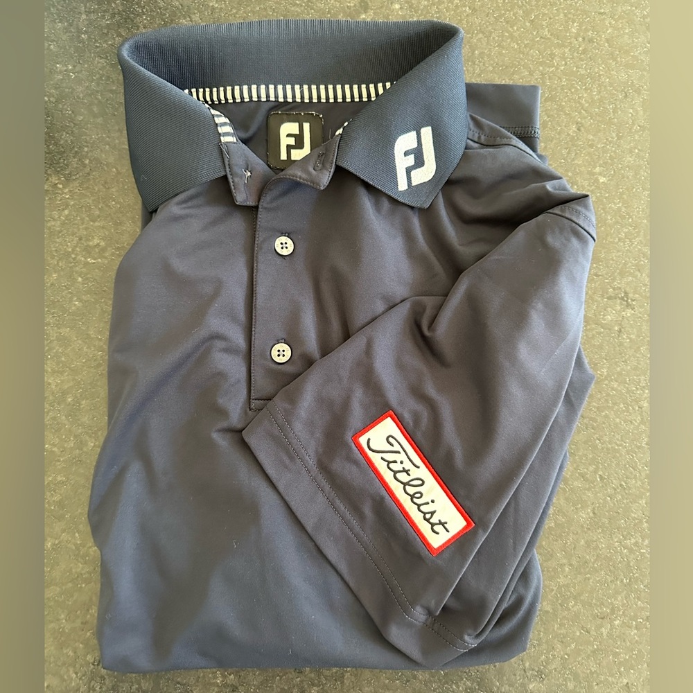 Navy blue golf shirt .. NWOT